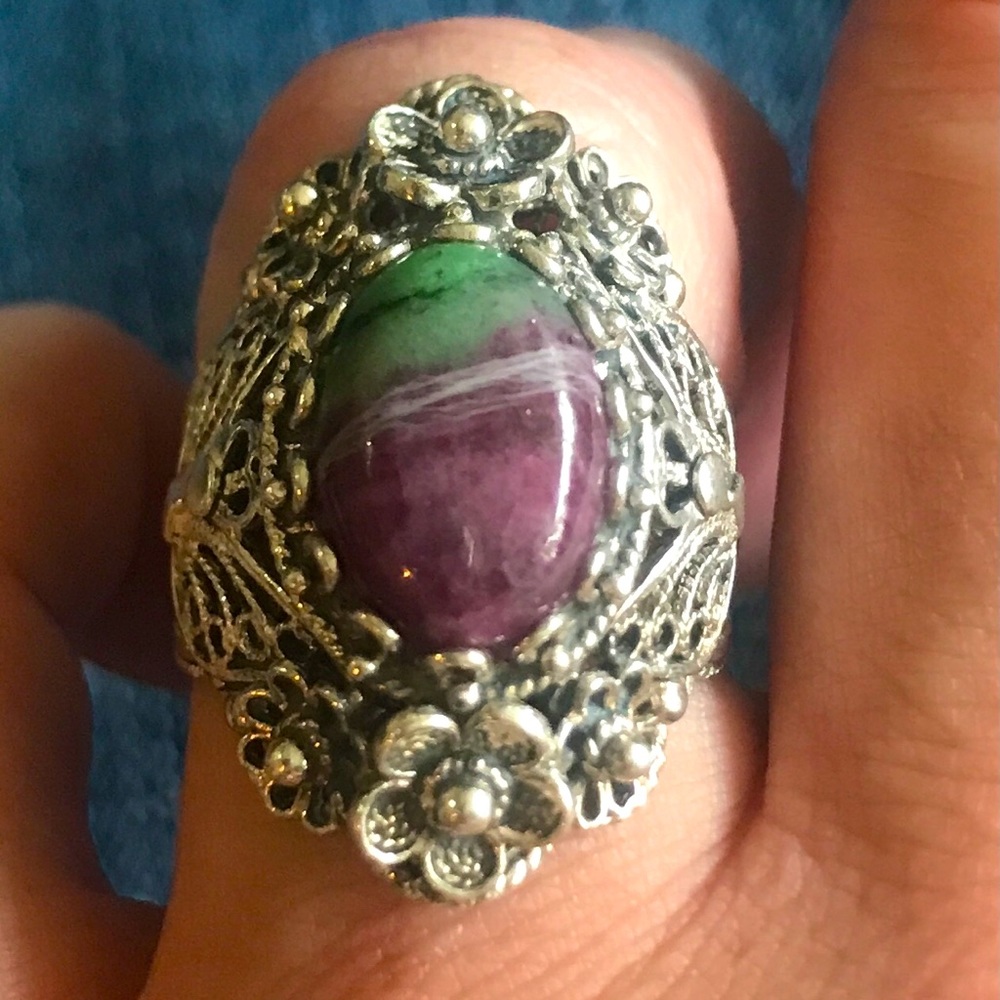 Filigree detailed sterling ring with purple and green stone